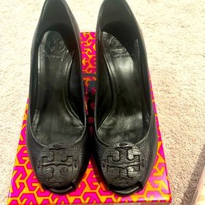 Tory Burch black peep toe wedge. slight wear on heal and spot on side. Size 7.5